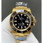 Rolex Submariner with black dial and gold bracelet, 40mm