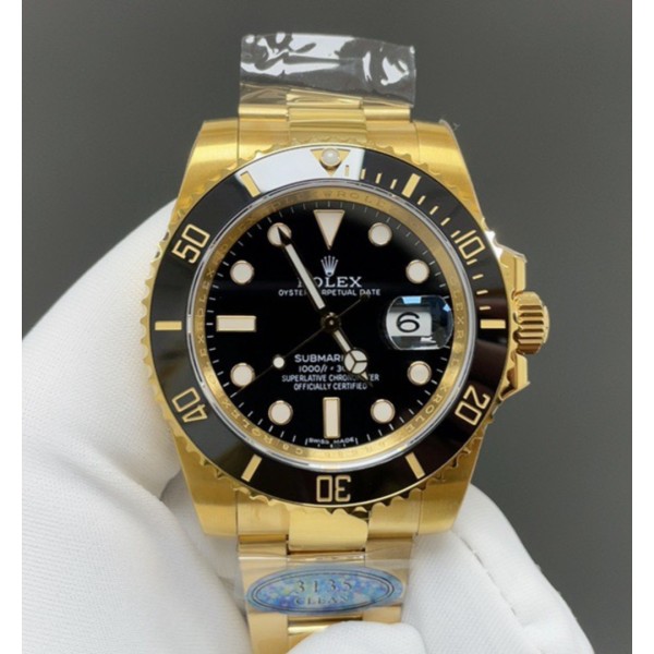 Rolex Submariner with black dial and gold bracelet, 40mm