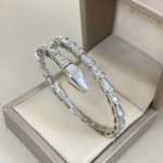 Bulgari Serpenti bracelet with mother-of-pearl and diamonds, available in gold, silver, and rose gold.