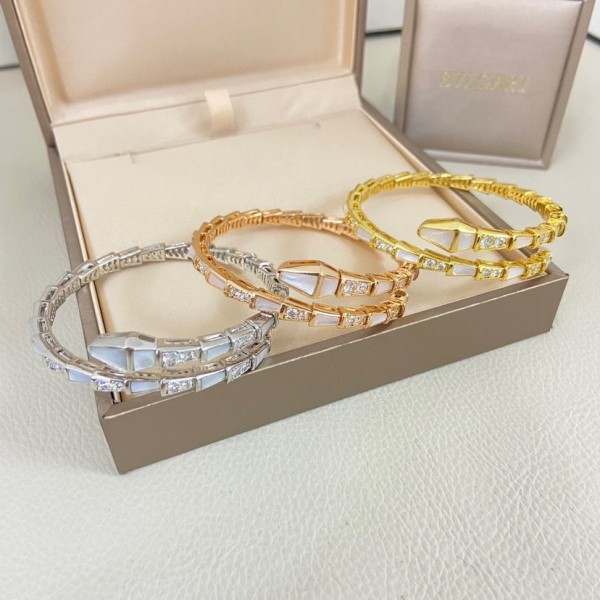 Bulgari Serpenti bracelet with mother-of-pearl and diamonds, available in gold, silver, and rose gold.