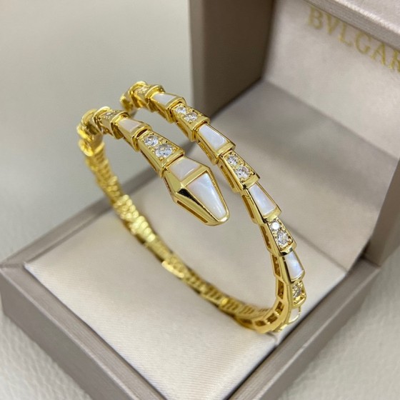 Bulgari Serpenti bracelet with mother-of-pearl and diamonds, available in gold, silver, and rose gold.