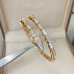 Bulgari Serpenti bracelet with mother-of-pearl and diamonds, available in gold, silver, and rose gold.