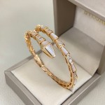 Bulgari Serpenti bracelet with mother-of-pearl and diamonds, available in gold, silver, and rose gold.