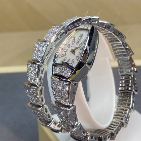 Bulgari Serpenti silver watch fully set with diamonds