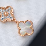Van Cleef & Arpels watch with white mother-of-pearl and diamond-set clover dial