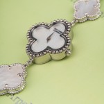 Van Cleef & Arpels watch with white mother-of-pearl clover dial