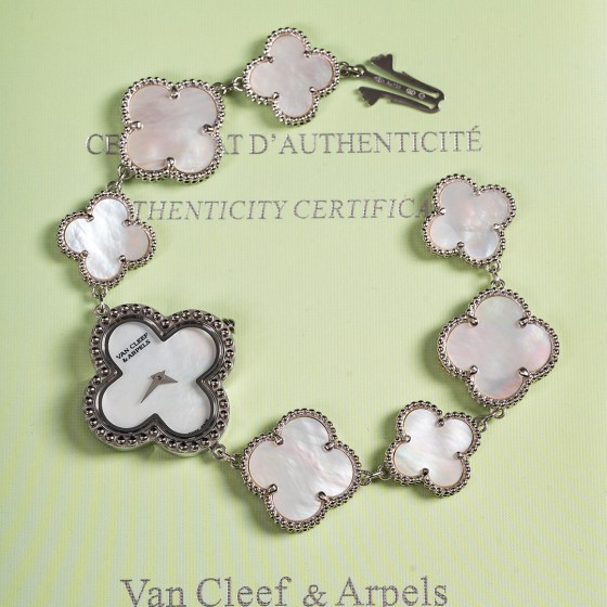 Van Cleef & Arpels watch with white mother-of-pearl clover dial