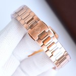 Patek Philippe Nautilus – Wave-pattern dial, rose gold bracelet, diamond-set bezel.
