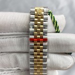 Datejust series, 31mm gold dial with diamonds, two-tone gold and silver strap.