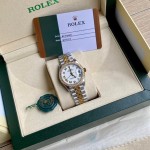 Datejust series, white dial with diamonds, 31mm, two-tone gold and silver strap.