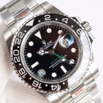 Rolex GMT-Master series, black dial, black bezel, 40mm, silver Oyster bracelet.