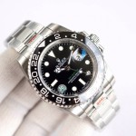 Rolex GMT-Master series, black dial, black bezel, 40mm, silver Oyster bracelet.