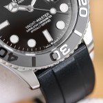 Rolex Yacht-Master series, black dial, gray bezel, silver case, 42mm, rubber strap.