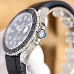 Rolex Yacht-Master series, black dial, gray bezel, silver case, 42mm, rubber strap.