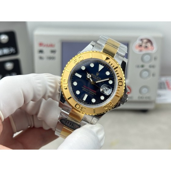 Yacht-Master series, black dial, gold bezel, 40mm, gold and silver bracelet.