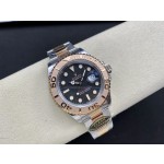 Yacht-Master series, black dial, rose gold bezel, 40mm, two-tone Oyster bracelet.