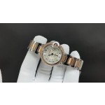 Cartier Ballon Bleu collection, 33mm silver dial with diamonds, rose gold two-tone strap, quartz watch.
