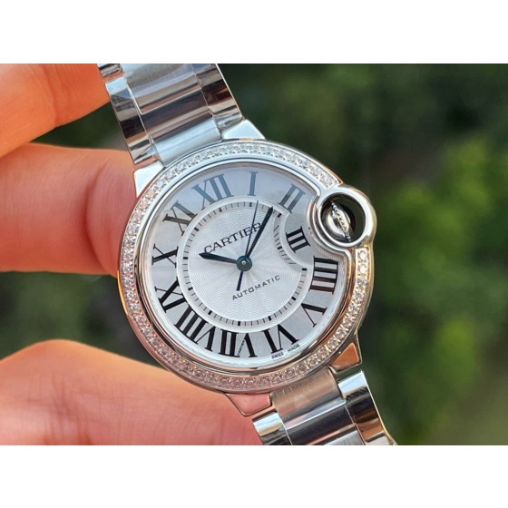 Cartier Ballon Bleu series, 33mm ladies' watch with silver dial and diamond setting, silver strap, mechanical movement.