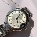 Cartier Ballon Bleu series, 33mm women's watch with silver dial and silver strap, quartz watch.