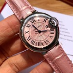 Cartier Ballon Bleu series, 33mm women's watch with pink dial, pink leather strap, mechanical movement.