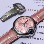 Cartier Ballon Bleu series, 33mm women's watch with pink dial, pink leather strap, mechanical movement.