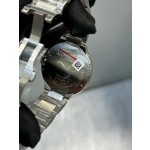 Cartier Ballon Bleu series, silver dial with diamond-set bezel, 42mm men's watch, silver strap, mechanical movement.