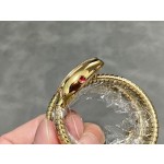 Bulgari Serpentl Collection: Red dial with diamonds and gold snake bezel