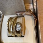 Bulgari Serpentl Collection: White dial with diamonds and gold snake bezel
