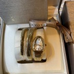 Bulgari Serpentl Collection: White dial with diamonds and gold snake bezel