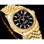 Navigator series men's watch, black dial, gold bezel, 42mm, gold five-link bracelet.