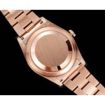 Voyager series men's watch, bright black dial, rose gold bezel, 42mm, rose gold Oyster bracelet.