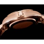 Voyager series men's watch, bright black dial, rose gold bezel, 42mm, rose gold Oyster bracelet.