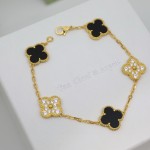 Four-leaf clover gold-plated black bracelet