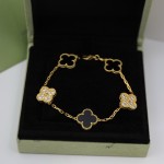 Four-leaf clover gold-plated black bracelet