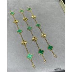 Four-leaf clover gold-interspersed green floral bracelet