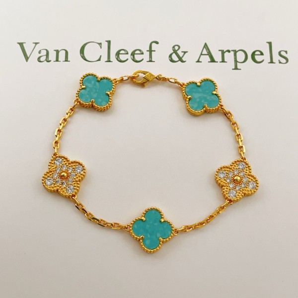 Four-leaf clover light blue and gold diamond-studded bracelet