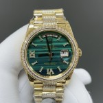 Sunday calendar series women's watch with malachite dial, diamond-set bezel, 36mm case, and diamond-set gold President-style bracelet.