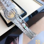 Patek Philippe Nautilus 5711, white dial, 40mm diameter, 8.8mm thickness.